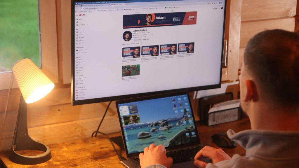 Adam Watters looking at YouTube channel